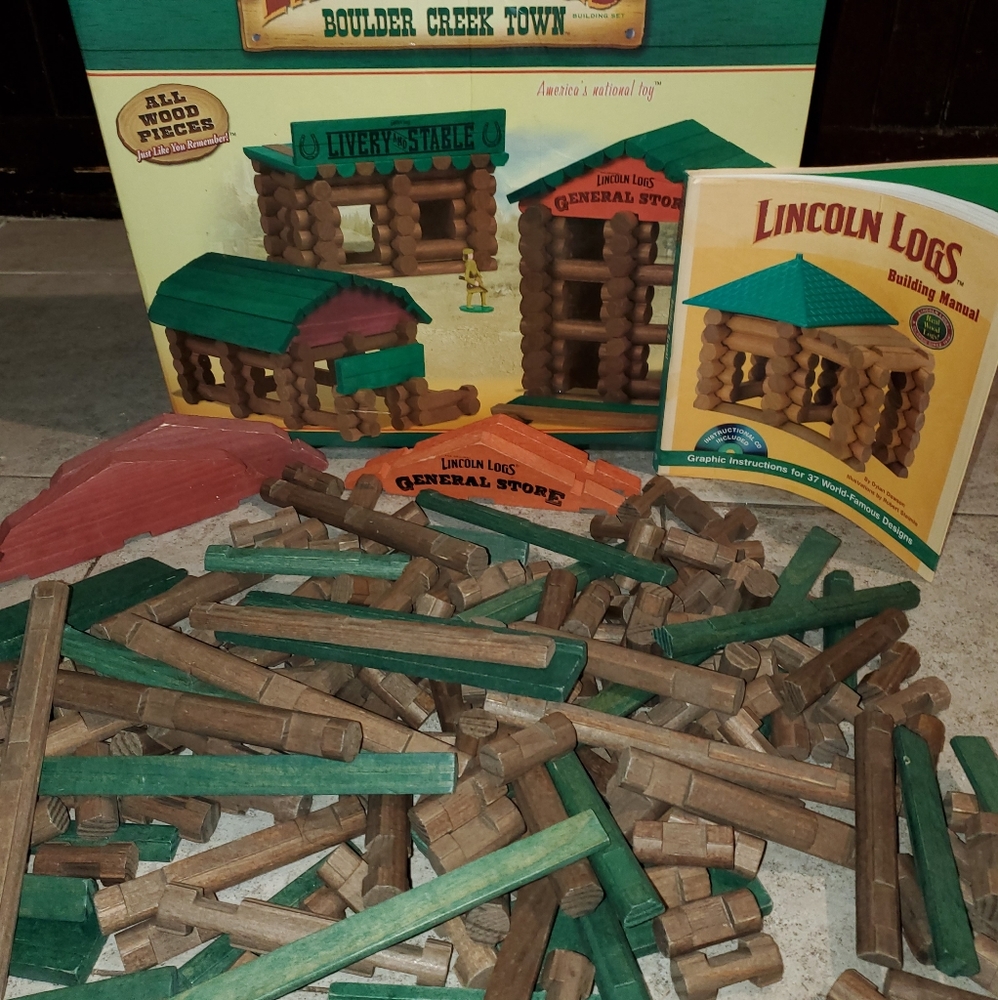 232 Lincoln logs/manual (missing 8 pieces)